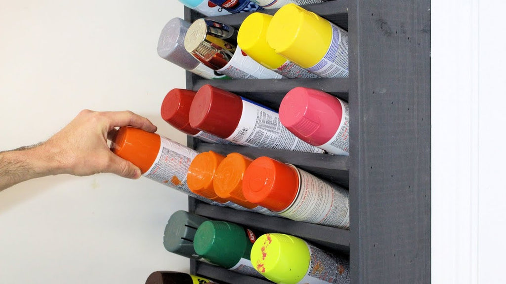 Spray Paint Can Holder Storage Rack We have a bunch of spray paint cans in our garage and needed a good place to store them