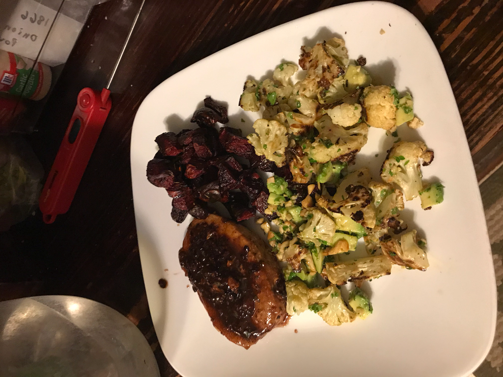 Blackberry sage pork chops, roasted beets, and cauliflower avocado lemon salad