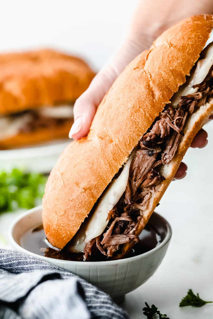 Slow Cooker French Dip Sandwiches (Melt in Your Mouth!!)